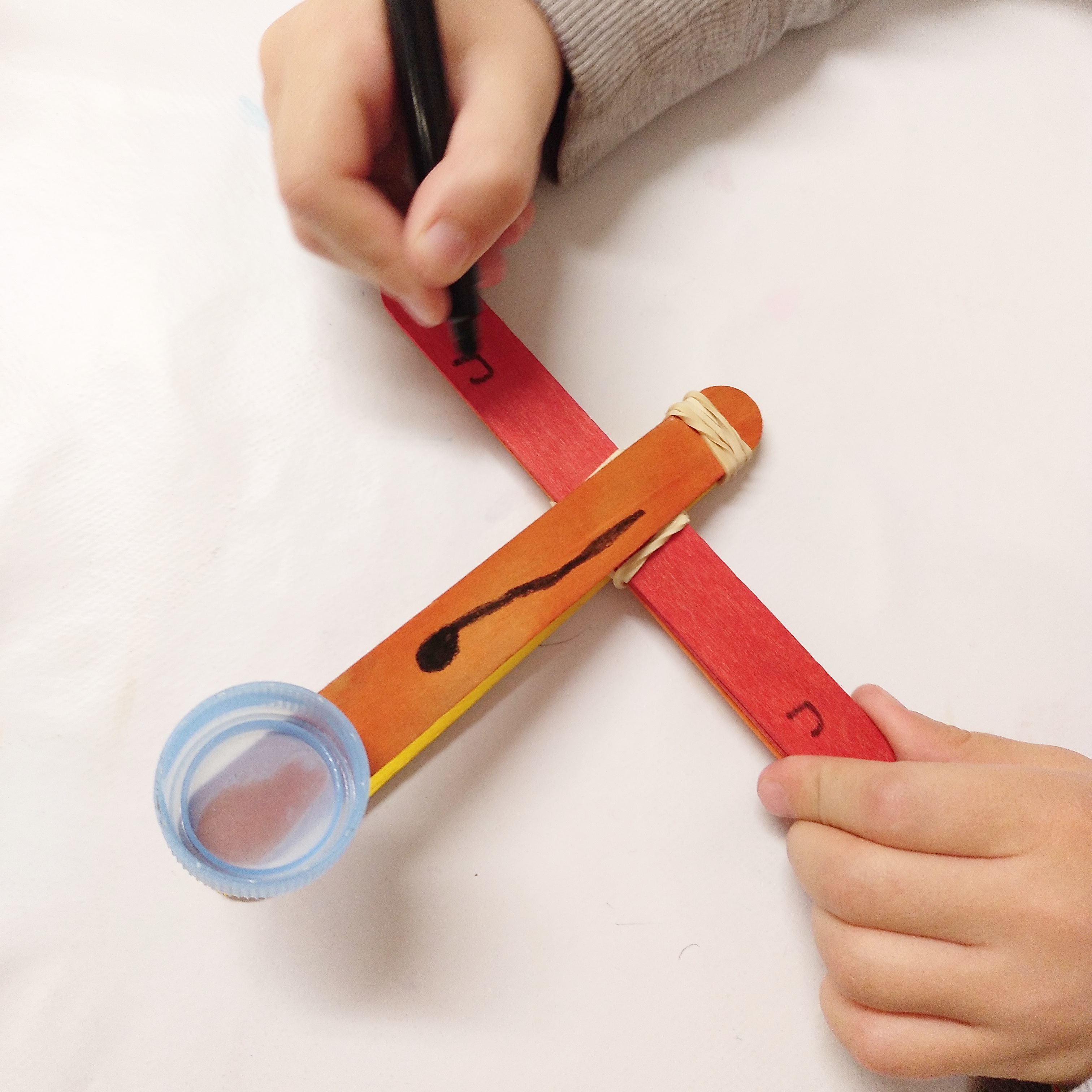 cómo hacer una catapulta